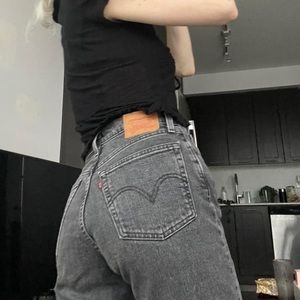 straight leg high rise black levi jeans